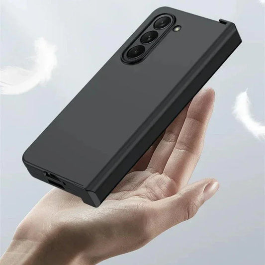 Hand holding a sleek black smartphone case with triple camera cutout and matte finish