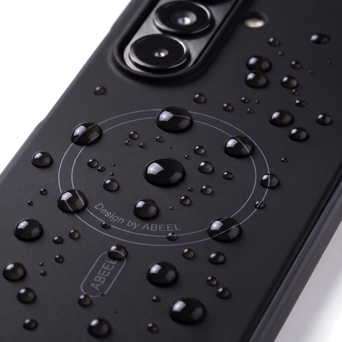 Water beading on the Black Apex M3 liquid-repellent, fingerprint-resistant coating