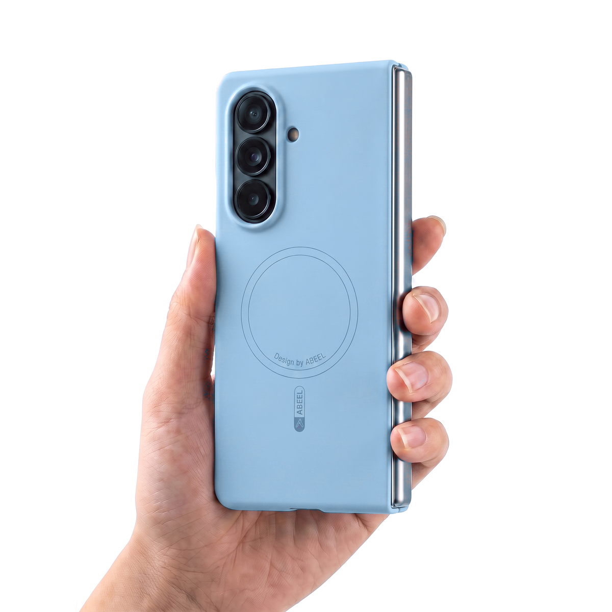 Hand holding a Galaxy Z Fold in the Light Blue Apex M3 case, showing its slim in-hand feel