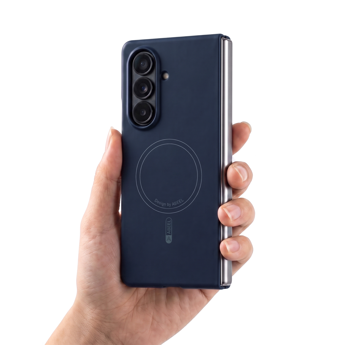 Hand holding a Galaxy Z Fold in the navy Apex M3 case, showing its slim in-hand feel