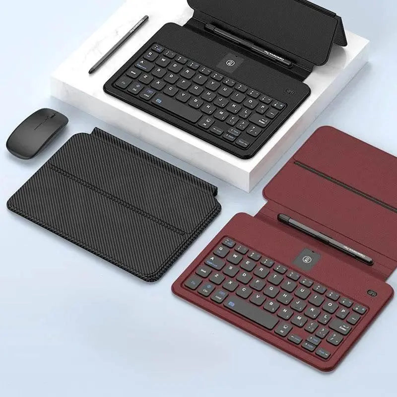 Black and red foldable wireless keyboards with pen holders and black wireless mouse on white surface