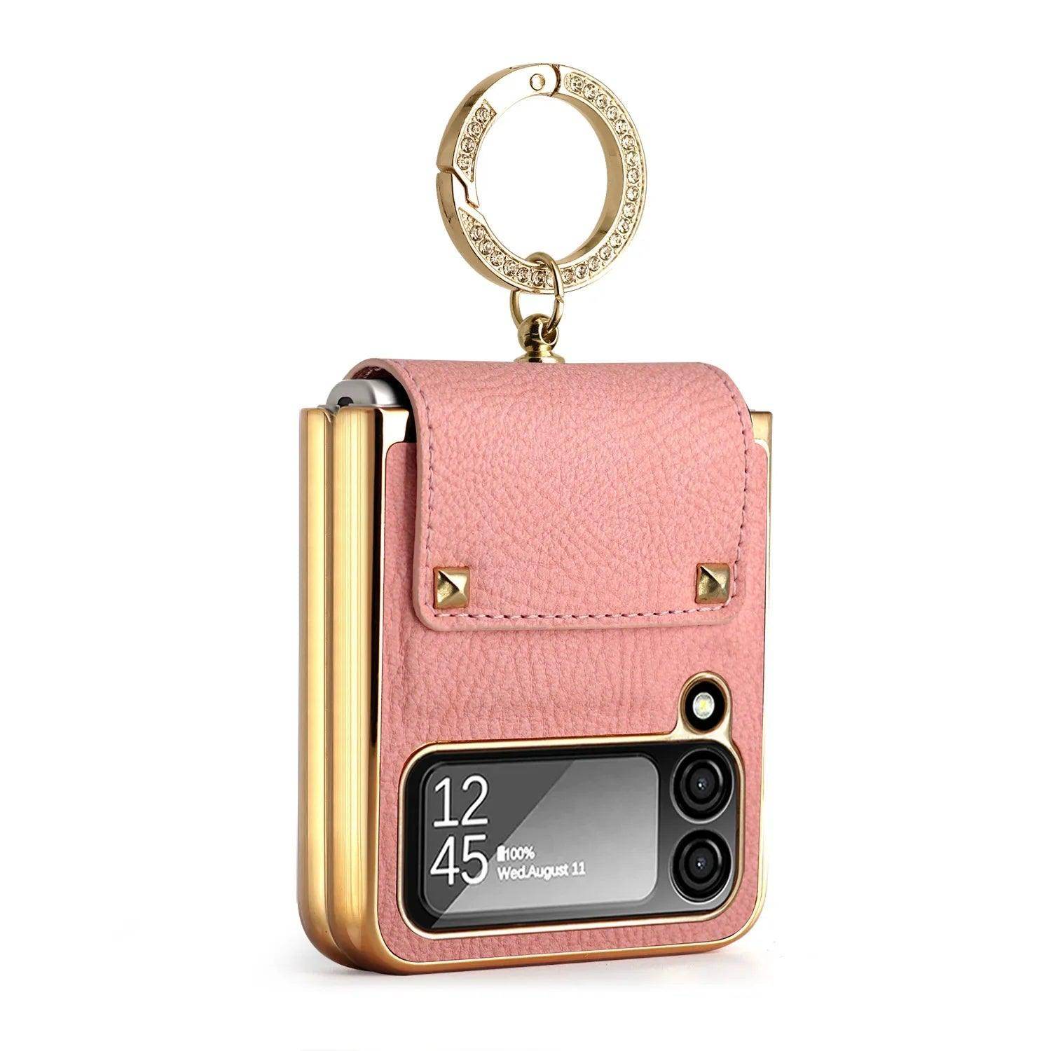 Pink leather phone case with gold studs and rhinestone key ring for foldable smartphone