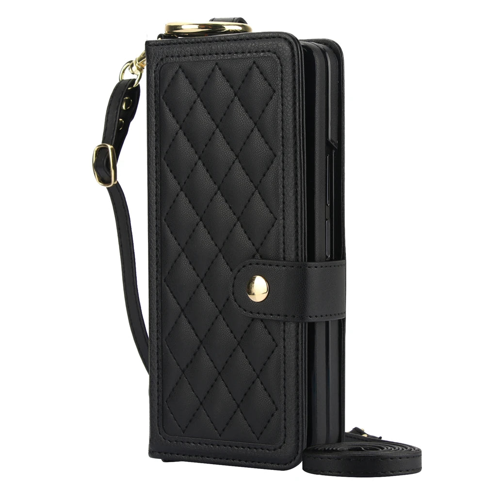 Black quilted phone wallet with strap on a white background